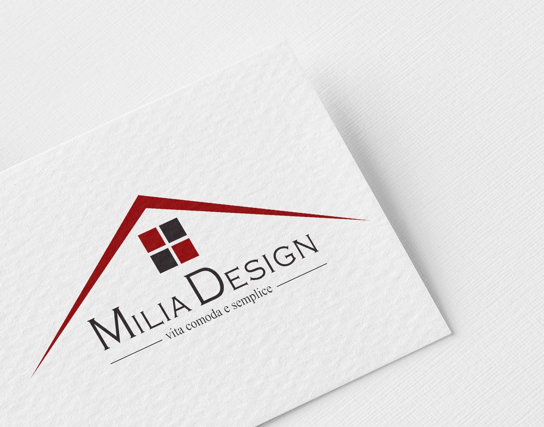 Milia Design logo, a red roof line over four squares, on a textured white card